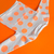 Buzo Círculos Naranja Fluo - tienda online