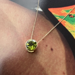 Peridoto Ponto De Luz Redondo em Ouro
