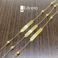Pulseira baby placa com bolinha ouro18k/750 (unidade) - comprar online