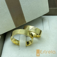 Par de alianças ouro18k/750 com pedras 10g