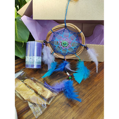 vela violeta y atrapasueños azul