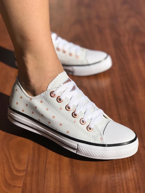 all star branco com estrelas douradas