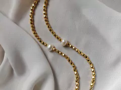 Pulseiras douradas e pérolas naturais - comprar online