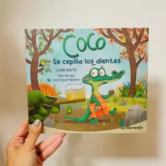 Coco se cepilla los dientes