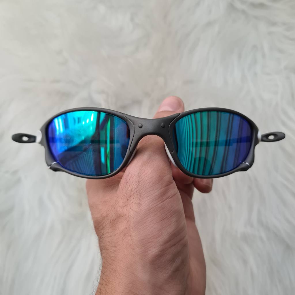 Preços baixos em Óculos de Sol Masculino Polarizado Oakley Juliet