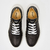 Quintin Negro - PASO+ Zapatillas que crean huella
