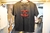 REMERA CHANEL MANGAS CORTAS LETRA ROJO BRILLOSA