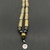 Strap de miçangas tubulares BEGE com acabamento escovado e pedras hematita em formato de disco - comprar online