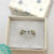 Anillo de Plata con detalles en Oro Cubic Blancos y Negros - comprar online