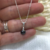 Dije de Plata con Cristal Negro