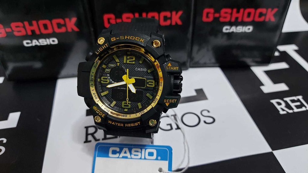 g shock shock resist dourado