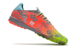 chuteira adidas prata e laranja