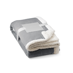 Manta personalizada reversível em tecido polar 190 g/m² acetinado com forro sherpa (225 g/m²), para um maior conforto na internet