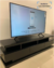 Mueble de tv hecho en madera laqueada y cajones con guía telescópica.