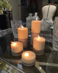 Vela XL base cemento con diarios