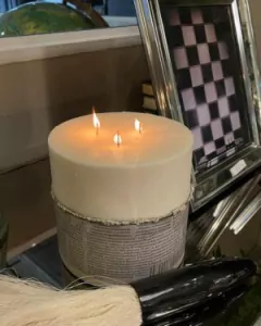 Vela XXL base cemento con diarios