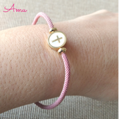 Pulsera cruz con madre perla (10pz) en internet