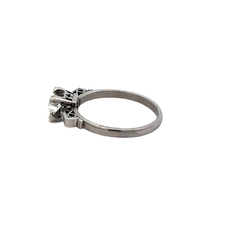 Platinum Solitaire Engagement Ring with French Diamonds - Joyería Alvear