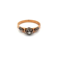 18kt gold solitaire engagement ring. platinum and diamonds.