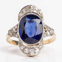 Anillo Oro 18kt y Platino 950. Zafiro Azul y Brillantes Deco
