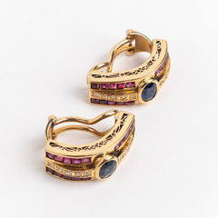 Gold, ruby, sapphire and diamond earrings on internet