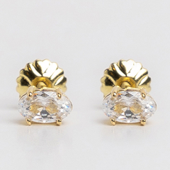 Aros solitario de oro 18 kt y zafiro blanco