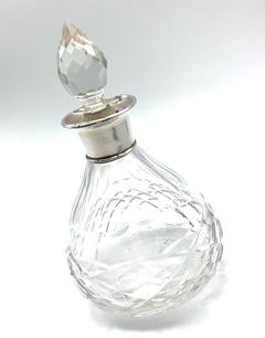 Pair of glass and silver perfume holders on internet