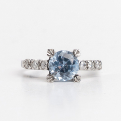 Solitaire ring of natural topaz and diamonds