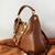 Bolsa VALENTINO GARAVANI Stud Sign - Preta ou Marrom