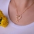 Colar Coração de Mãe com Patinha - Folheado em Ouro 18k PetMom na internet