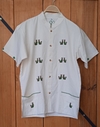 CAMISA CON BORDADO HECHO A MANO