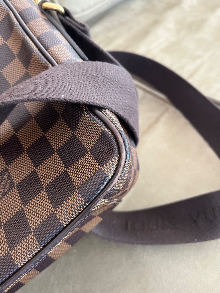 Preços baixos em Bolsas de couro para homens Louis Vuitton