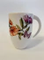 Caneca Flores e borboleta na internet