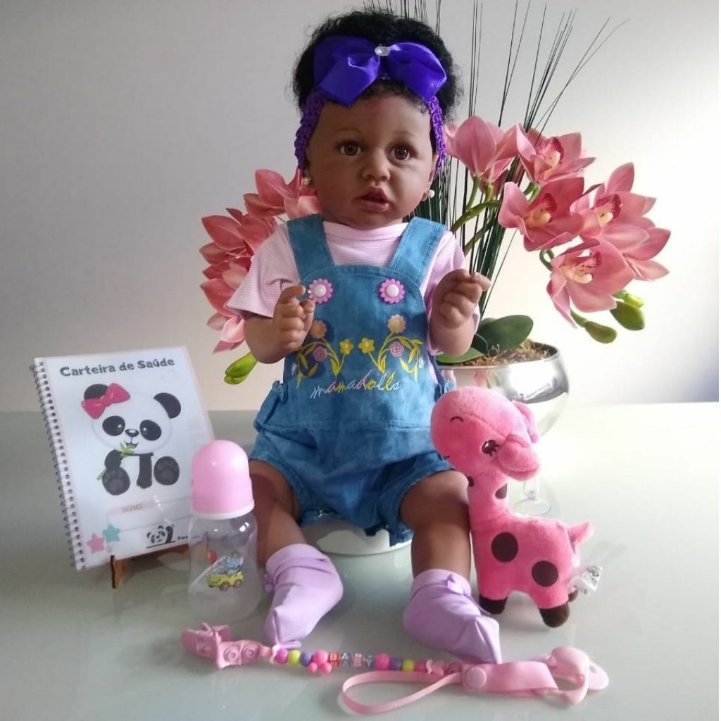 Bebê Reborn Silicone roupinha rosa com florzinhas olho azul