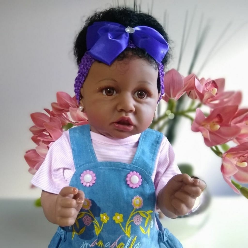 Bebê Reborn Silicone roupinha rosa com florzinhas olho azul