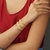 Brazalete dorado jardin flores