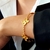 Pulsera trébol dorada