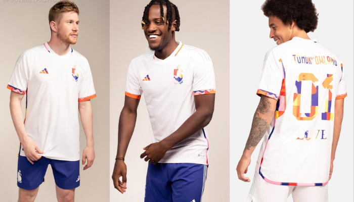 Camisa de futebol da seleção belga, modelo reserva da temporada 2022-2023. Predominantemente branca, apresenta detalhes coloridos inspirados no festival Tomorrowland. Detalhes como a gola V, punhos e laterais com padrão colorido, escudo da Bélgica e logo da Adidas lateralizados, e a palavra "LOVE" na nuca completam o design.