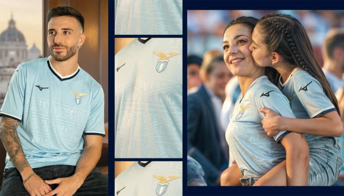 camisa titular oficial da Lazio para a temporada 2024/2025, produzida pela Mizuno. A camisa, predominantemente azul celeste, apresenta o nome "SS Lazio" em relevo, acompanhado por linhas em zigue-zague.