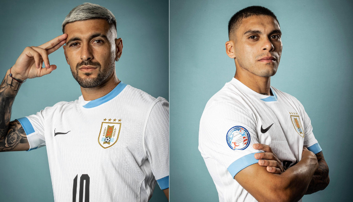 Camisa Reserva da Seleção Uruguaia Nike 2024-2025 branca com gola redonda bicolor (azul celeste e branco), punhos em azul celeste, escudo da AUF no lado esquerdo do peito, logo da Nike em preto no lado direito e numeração preta nas costas.