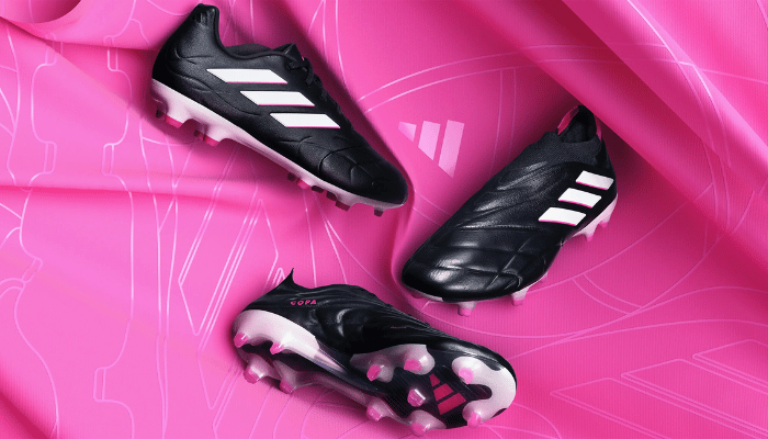 Chuteira Adidas Copa Pure+ FG preta/Core Black/Zero Met./Team Shock Pink - Desempenho, elegância e conforto. Ajuste perfeito com Fusionskin, estabilidade Torsion Frame. Escolha dos campeões: Ilkay Gundogan, Bernardo Silva, Melanie Leupolz.