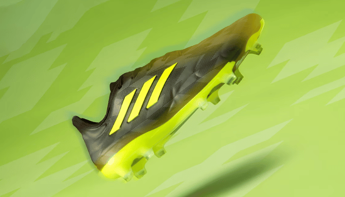 Chuteira Adidas Copa Pure.1 FG Crazycharged em Preto Essencial/Amarelo Solar 2/Cinza Cinco - Design aerodinâmico, couro Fusionskin, gráficos supercarregados. Desempenho premium em campo.