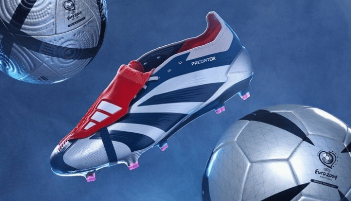 chuteira adidas Predator 24 Foldover Tongue FG Roteiro em vermelho, prata e metálico. A chuteira possui um cabedal de couro FUSIONSKIN com lamelas STRIKESKIN na zona de impacto para melhor controle de bola. A lingueta dobrável clássica proporciona um ajuste confortável e preciso. A sola CONTROLFRAME 2.0 oferece estabilidade e tração em gramados firmes.