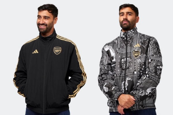 Jaqueta Reversível Anthem Arsenal x Ian Wright Adidas 2023-2024 em preto, cinza e dourado. Design exclusivo homenageando o legado de Ian Wright com gráficos inspirados em sua carreira no futebol