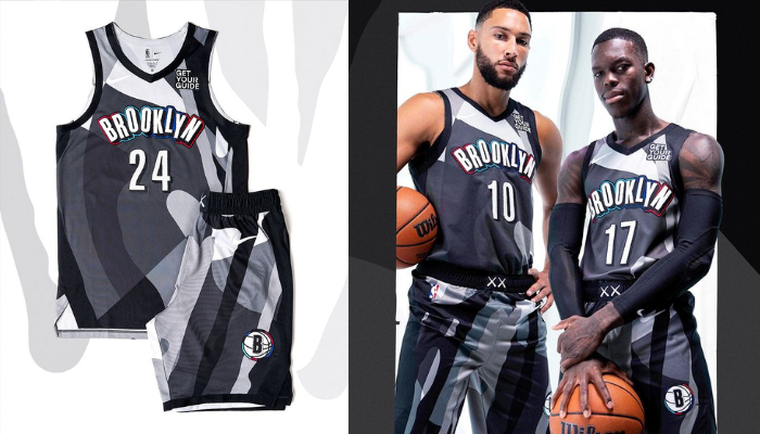 camisa City Edition do Brooklyn Nets para a temporada 2024-25, fruto da colaboração com o artista KAWS. A regata preta e cinza apresenta um design moderno e ousado, com elementos icônicos do trabalho de KAWS, como as mãos companheiras e os olhos grandes, sobrepostos ao logo dos Nets.