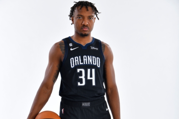 Regata City Edition Orlando Magic Nike 2022/23 em preto, azul marinho e branco - símbolo de vitória, coração de campeão e lealdade ao reino da Magia | Tevo Sports