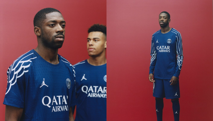 Quarta camisa do Paris Saint-Germain Jordan 2025-2026, modelo azul marinho com asas brancas do logo Air Jordan aplicadas nas mangas. Disponível em versões de manga curta e longa. Escudo do PSG em azul marinho e branco no lado esquerdo do peito, com o logo Air Jordan na mesma tonalidade no lado direito.