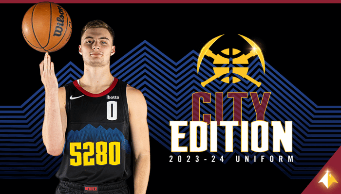 Regata City Edition Denver Nuggets 2023-24. A regata é preta com detalhes em azul, amarelo e vermelho. Na frente, há o logotipo do Denver Nuggets. Nas costas, há o número 5280 em amarelo. A regata é feita de tecido Nike Dri-FIT e possui um caimento justo.