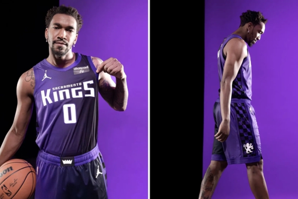 Regata Sacramento Kings Jordan 2023/24 Edição Statement - Gradiente roxo a preto, logo Jordan e padrão xadrez lateral, homenageando a tradição dos Kings 94-97.