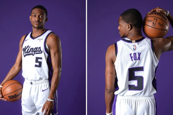 Regata Sacramento Kings Nike 2023/24 - Edição Association em Branco, Roxo e Preto. Design arrojado com letras Kings e números em preto, contorno roxo. Qualidade Nike para um visual marcante.